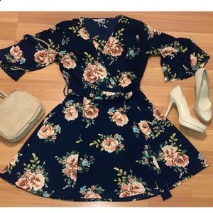 Navy blue floral tie waist dress with bell sleeves